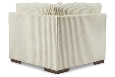 Lindyn Ivory Wedge from Ashley - Luna Furniture