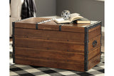 Kettleby Brown Storage Trunk from Ashley - Luna Furniture