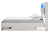 Altyra White Queen Upholstered LED Bookcase Storage Platform Bed from Ashley - Luna Furniture
