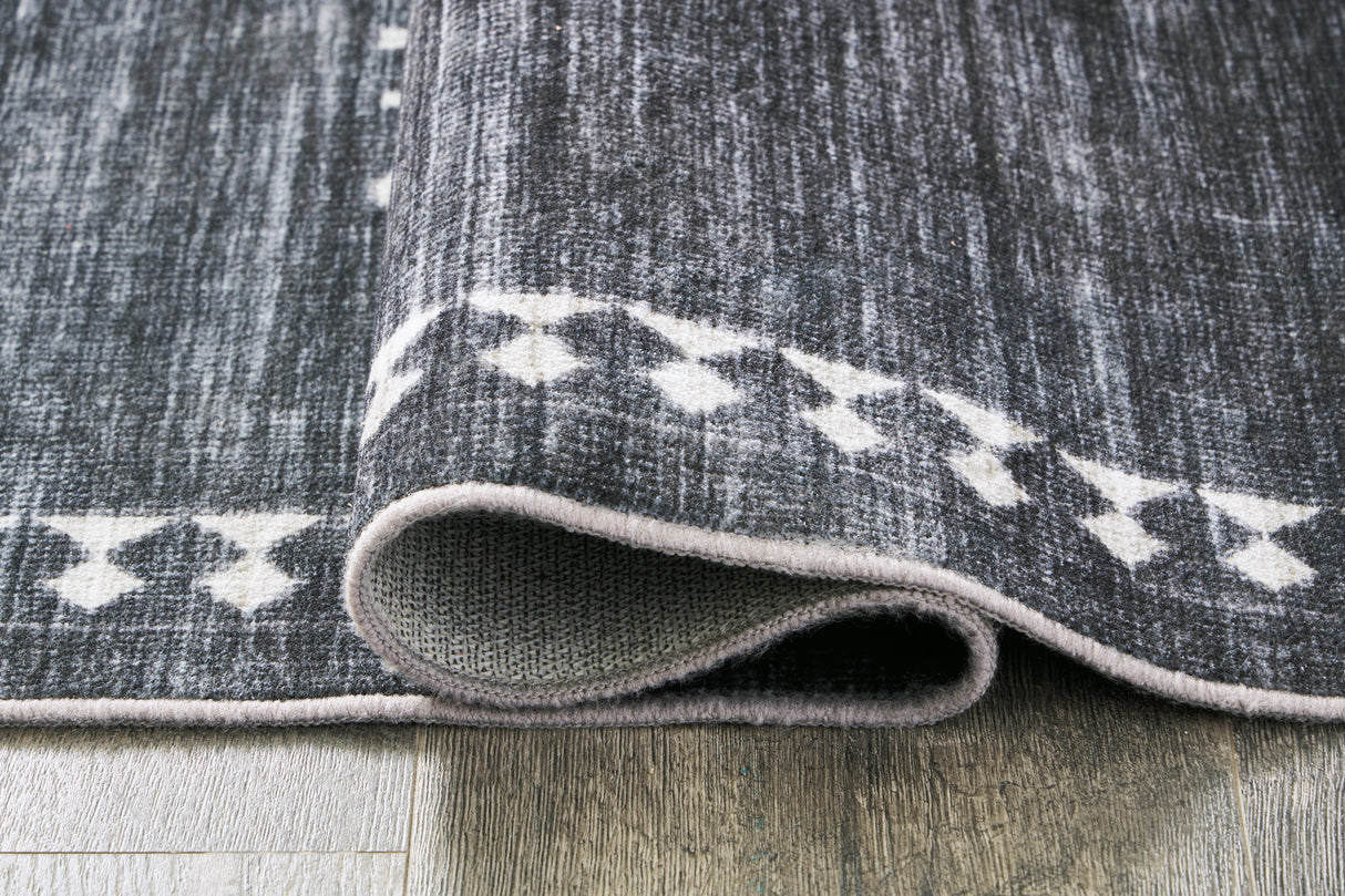 Arloman Black/Cream/Gray 5' x 7' Rug from Ashley - Luna Furniture
