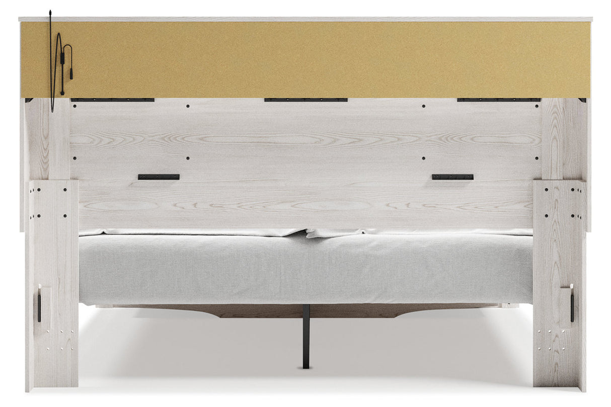 Altyra White King Upholstered LED Bookcase Storage Platform Bed from Ashley - Luna Furniture