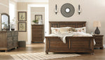 Flynnter Medium Brown Panel Bedroom Set