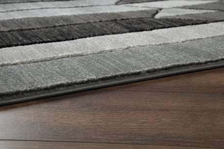 Chayse Black/Gray 6'6" x 9'6" Rug from Ashley Furniture - Luna Furniture