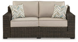 Coastline Bay Brown Outdoor Loveseat with Cushion from Ashley - Luna Furniture