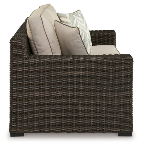 Coastline Bay Brown Outdoor Loveseat with Cushion from Ashley - Luna Furniture