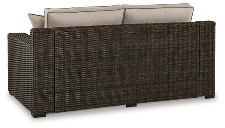 Coastline Bay Brown Outdoor Loveseat with Cushion from Ashley - Luna Furniture