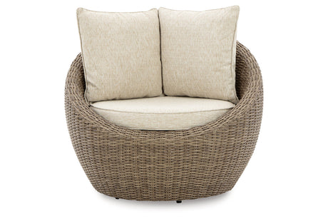 DANSON Beige Swivel Lounge with Cushion from Ashley - Luna Furniture