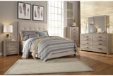 Dolante Beige Queen Upholstered Bed from Ashley - Luna Furniture