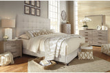 Dolante Beige Queen Upholstered Bed from Ashley - Luna Furniture