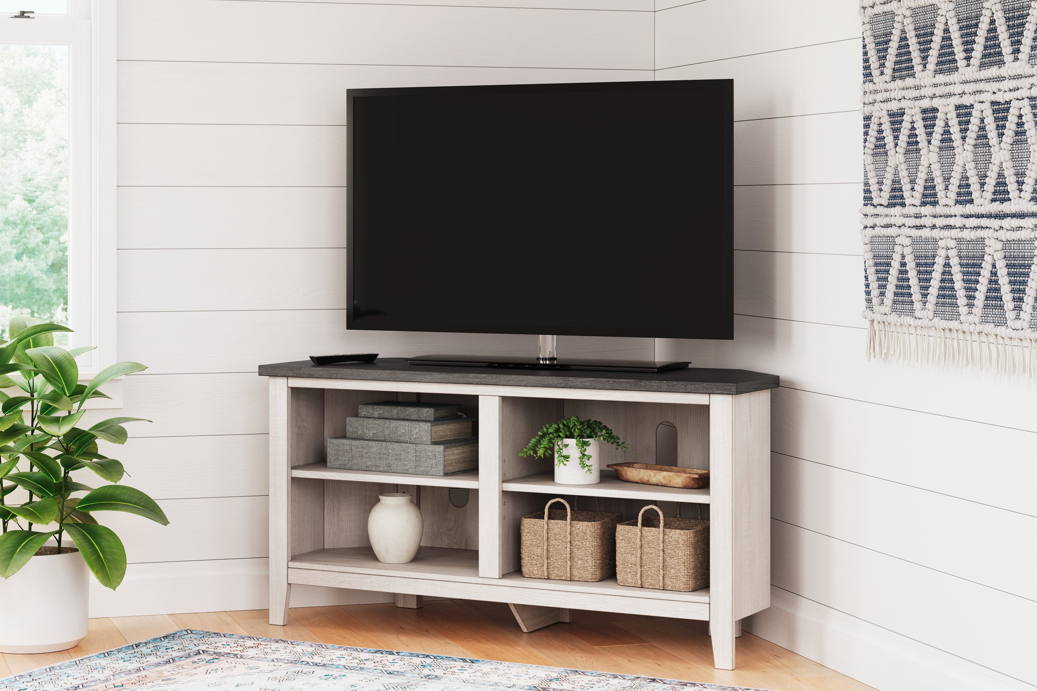 Dorrinson Two-tone Corner TV Stand from Ashley - Luna Furniture