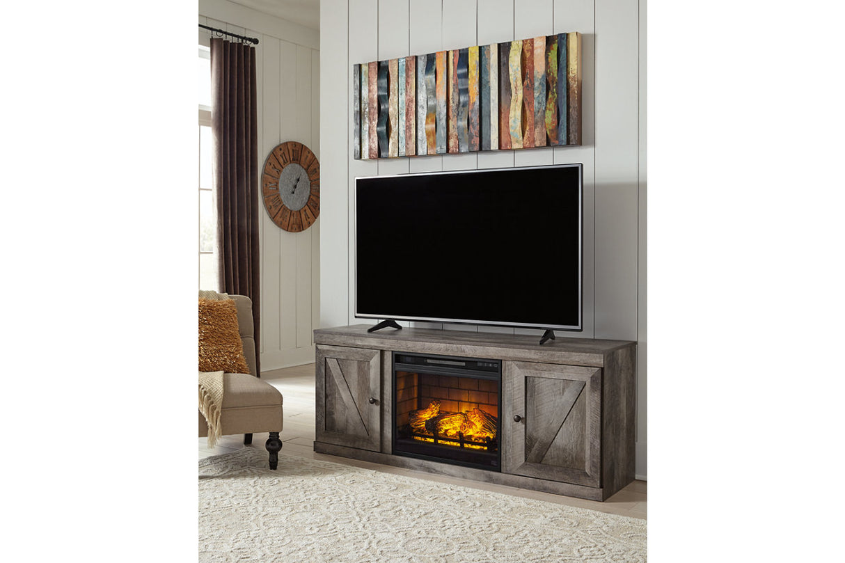 Wynnlow Gray TV Stand with Electric Fireplace from Ashley - Luna Furniture