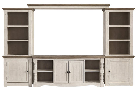 Havalance Two-tone 4-Piece Entertainment Center from Ashley - Luna Furniture