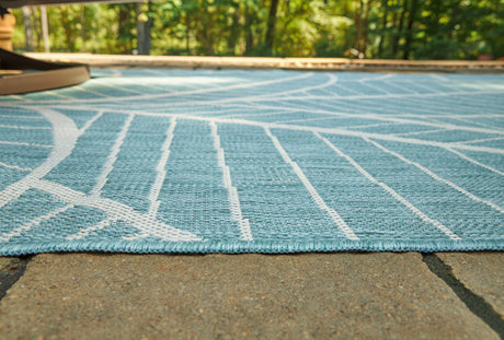 Hulsia Ivory/Aqua 5' x 7' Rug from Ashley - Luna Furniture