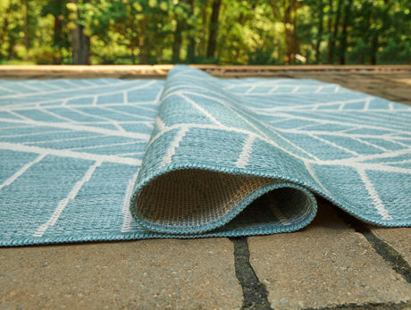 Hulsia Ivory/Aqua 5' x 7' Rug from Ashley - Luna Furniture