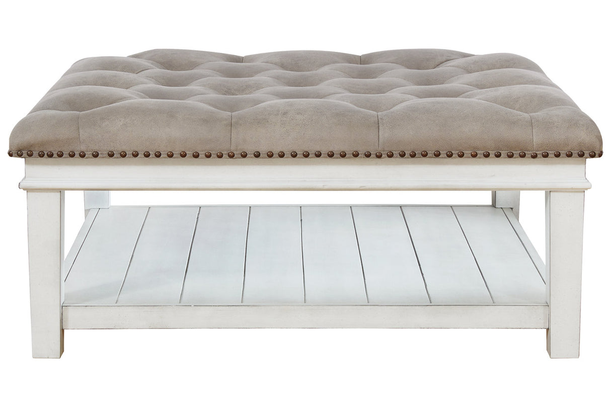 Kanwyn Whitewash Upholstered Ottoman Coffee Table from Ashley - Luna Furniture
