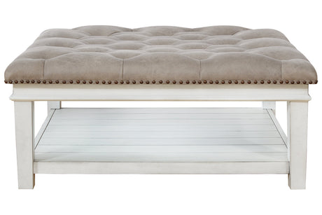 Kanwyn Whitewash Upholstered Ottoman Coffee Table from Ashley Furniture - Luna Furniture