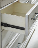 Kanwyn Whitewash Upholstered Storage Panel Bedroom Set from Ashley - Luna Furniture