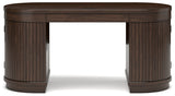 Korestone Warm Brown 63" Home Office Desk from Ashley - Luna Furniture