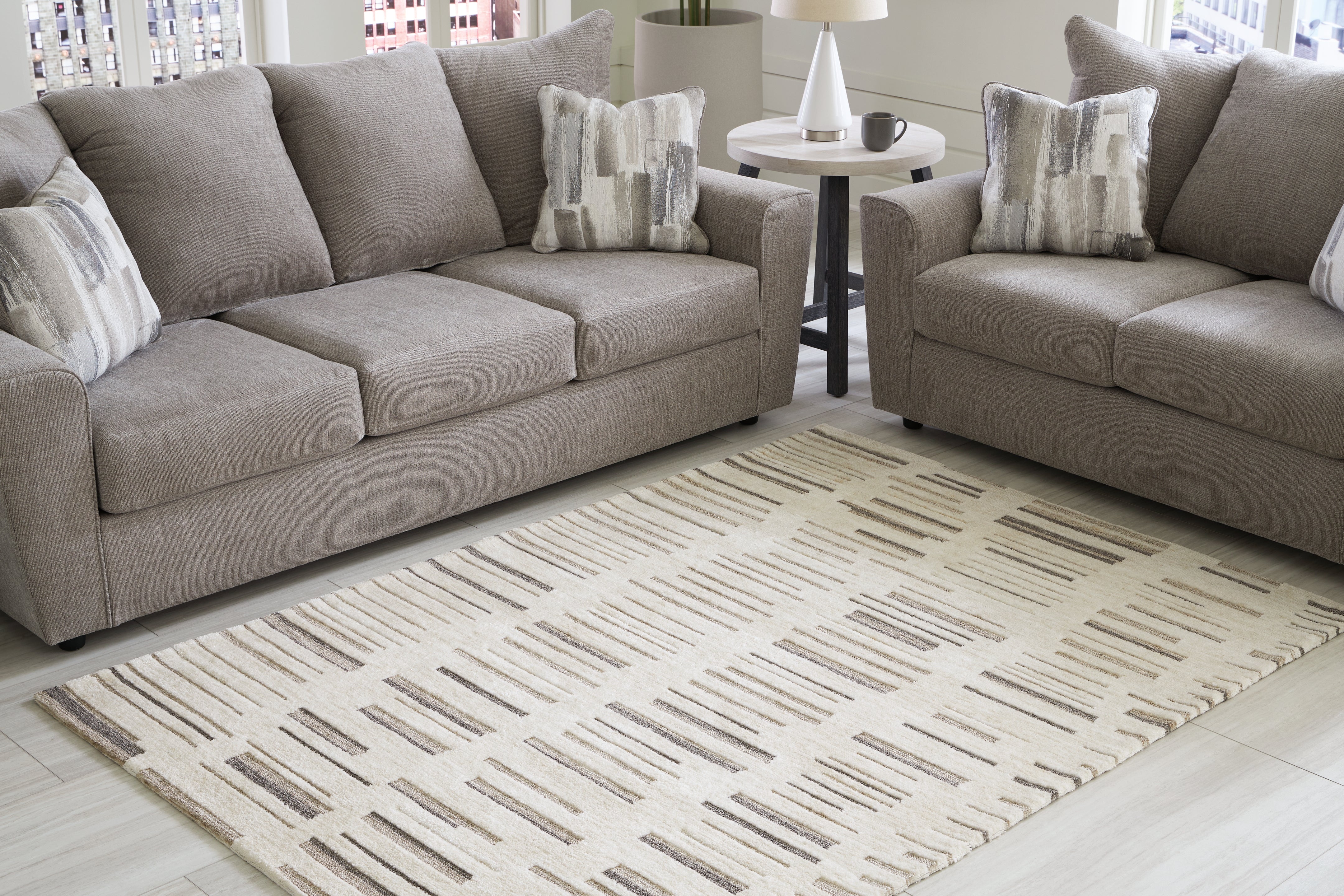 Leesdale Ivory/Brown/Black 5' x 7' Rug - Luna Furniture