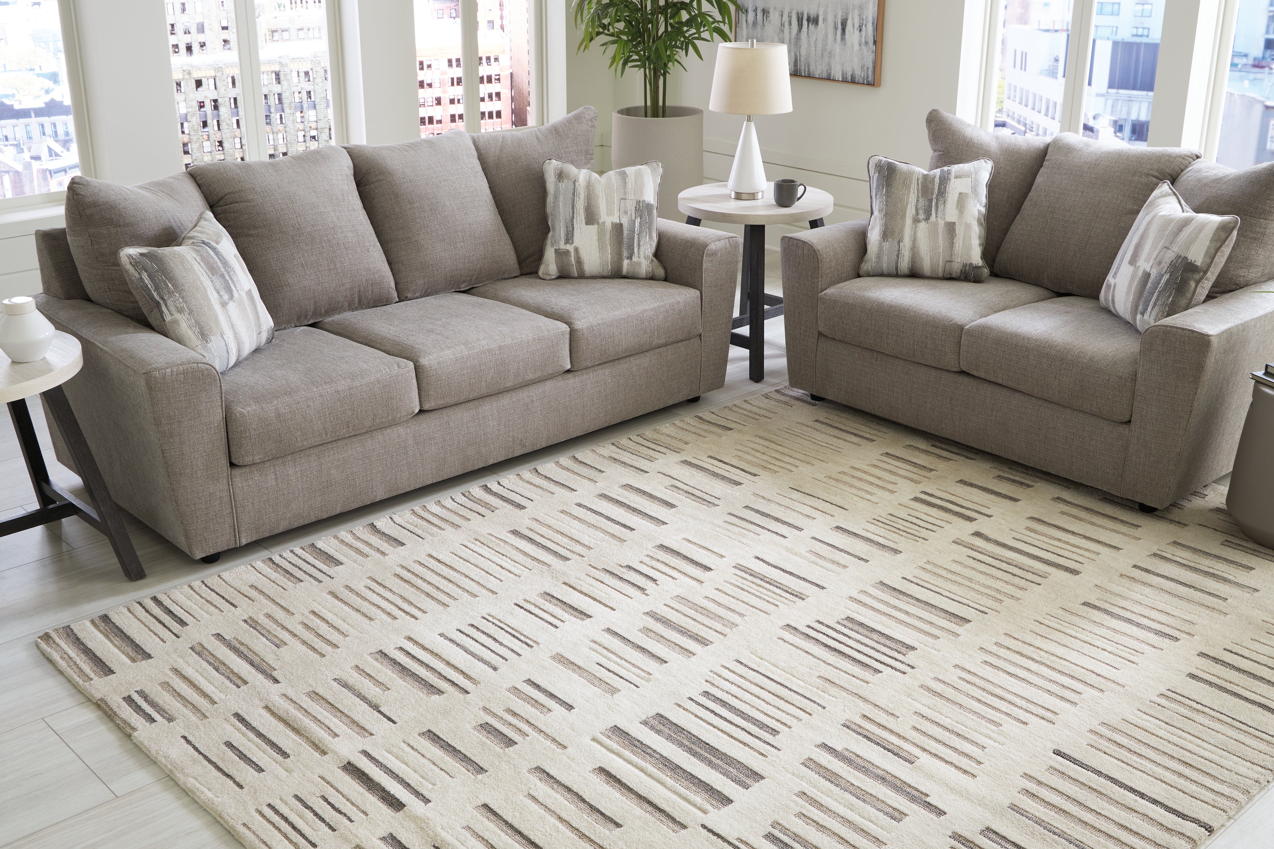Leesdale Ivory/Brown/Black 5' x 7' Rug - Luna Furniture