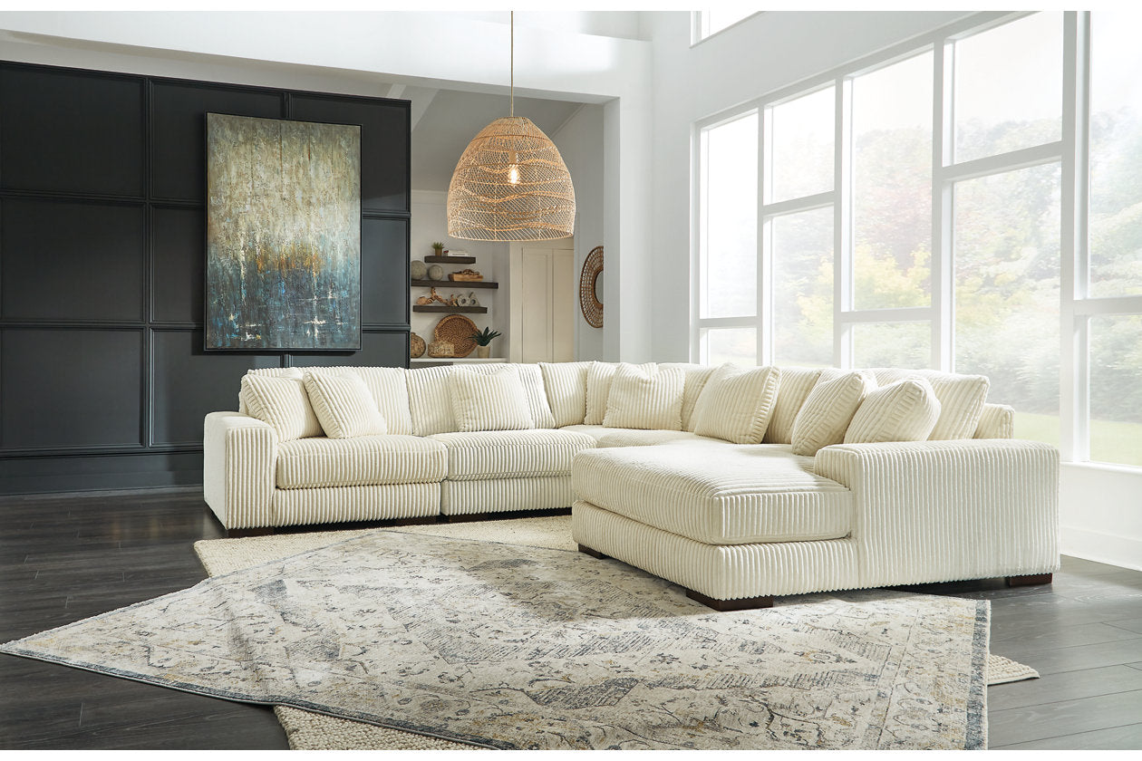 Ashley Lindyn Ivory 5-Piece RAF Chaise Sectional – Luna Furniture