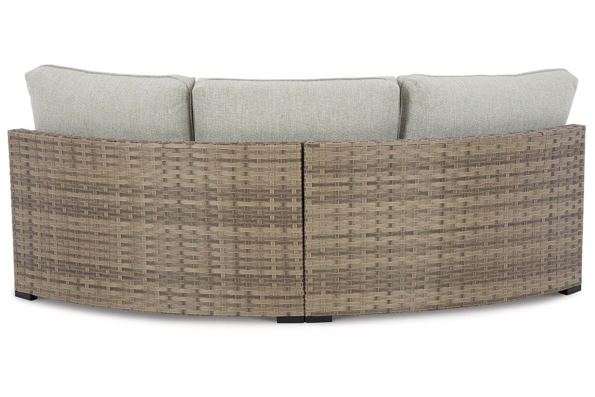 Calworth Beige Outdoor Curved Loveseat with Cushion