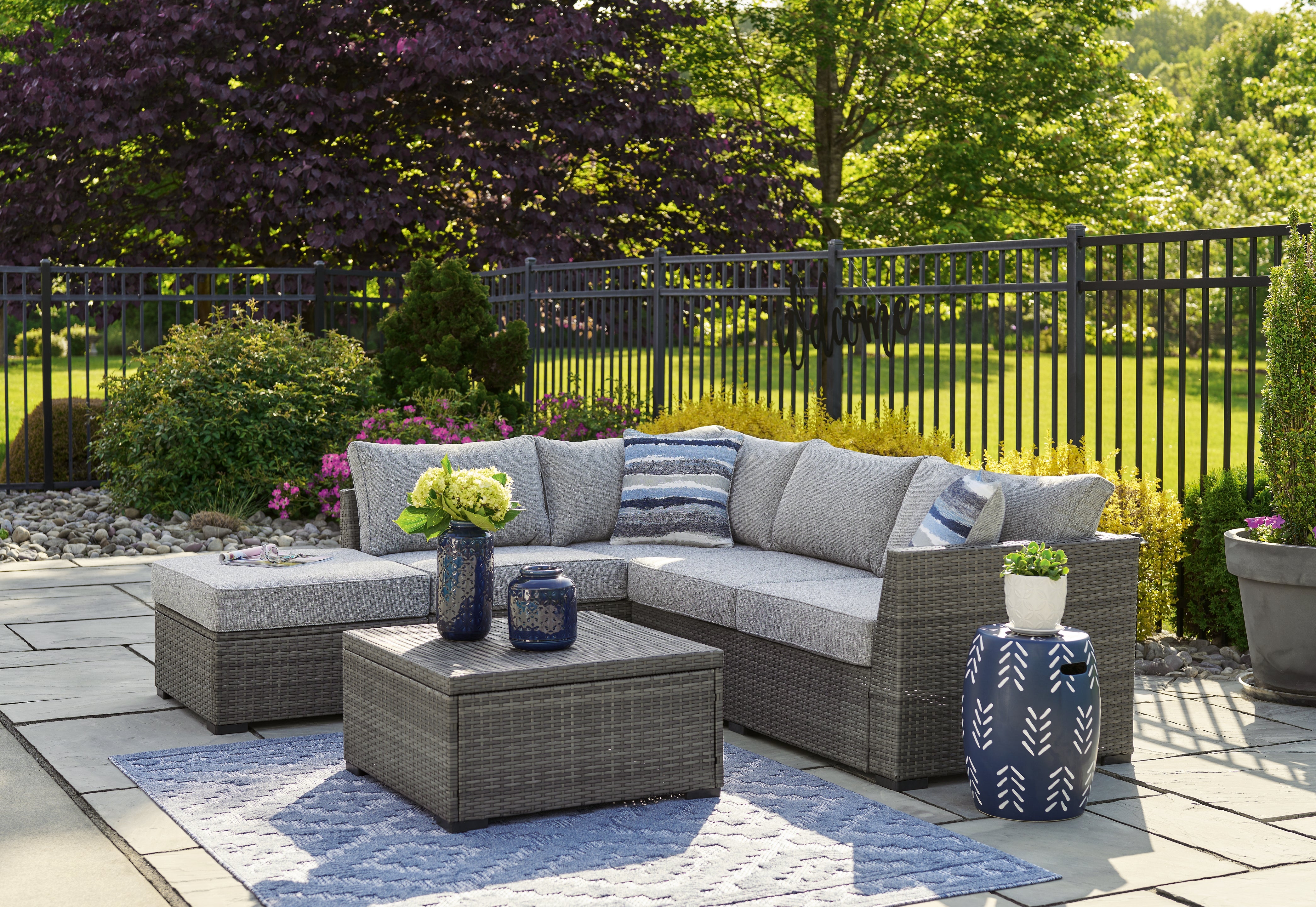 Ashley Petal Road Gray Outdoor Loveseat Sectional/Ottoman/Table