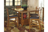 Ralene Medium Brown Counter Height Dining Extension Table from Ashley - Luna Furniture