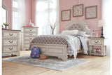 Realyn Chipped White Full Upholstered Panel Bed from Ashley - Luna Furniture