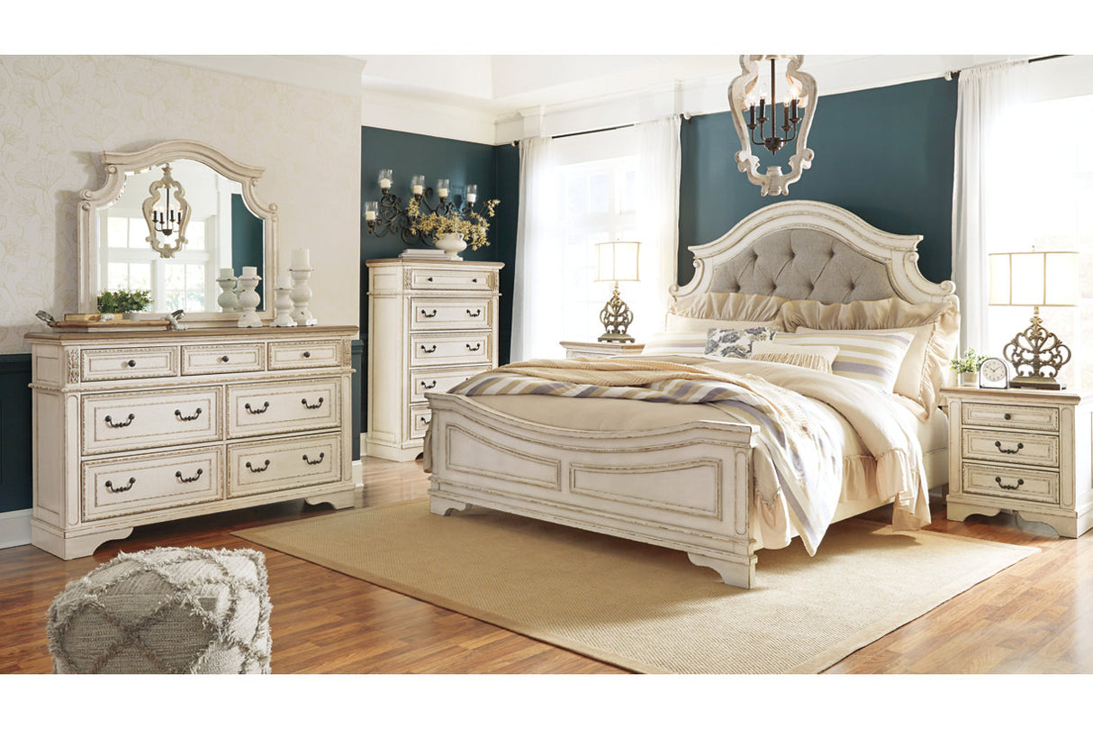 Realyn Chipped White King Upholstered Panel Bed from Ashley - Luna Furniture