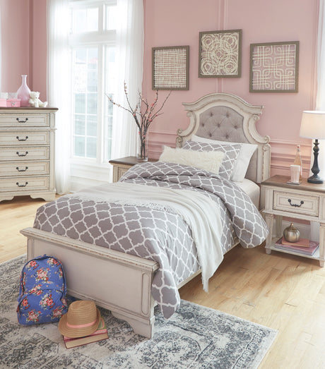 Realyn Chipped White Upholstered Youth Panel Bedroom Set from Ashley - Luna Furniture
