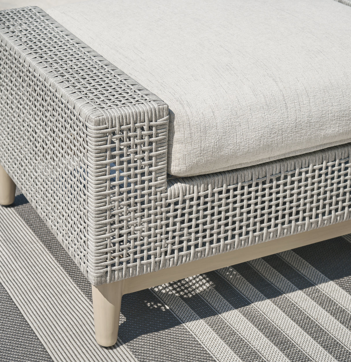 Seton Creek Gray Outdoor Ottoman with Cushion from Ashley - Luna Furniture
