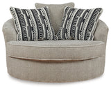 Calnita Sisal Oversized Swivel Accent Chair from Ashley - Luna Furniture