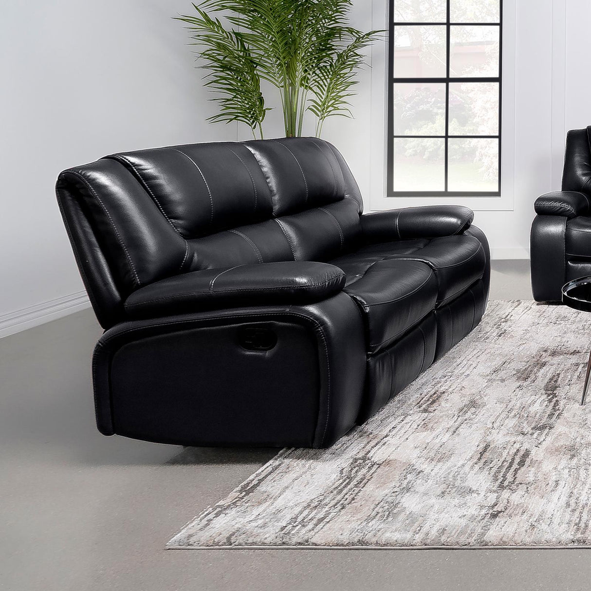 Camila Black Upholstered Motion Reclining Loveseat from Coaster - Luna Furniture
