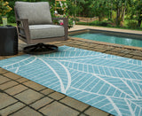 Hulsia Ivory/Aqua 5' x 7' Rug from Ashley - Luna Furniture