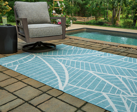 Hulsia Ivory/Aqua 5' x 7' Rug from Ashley - Luna Furniture