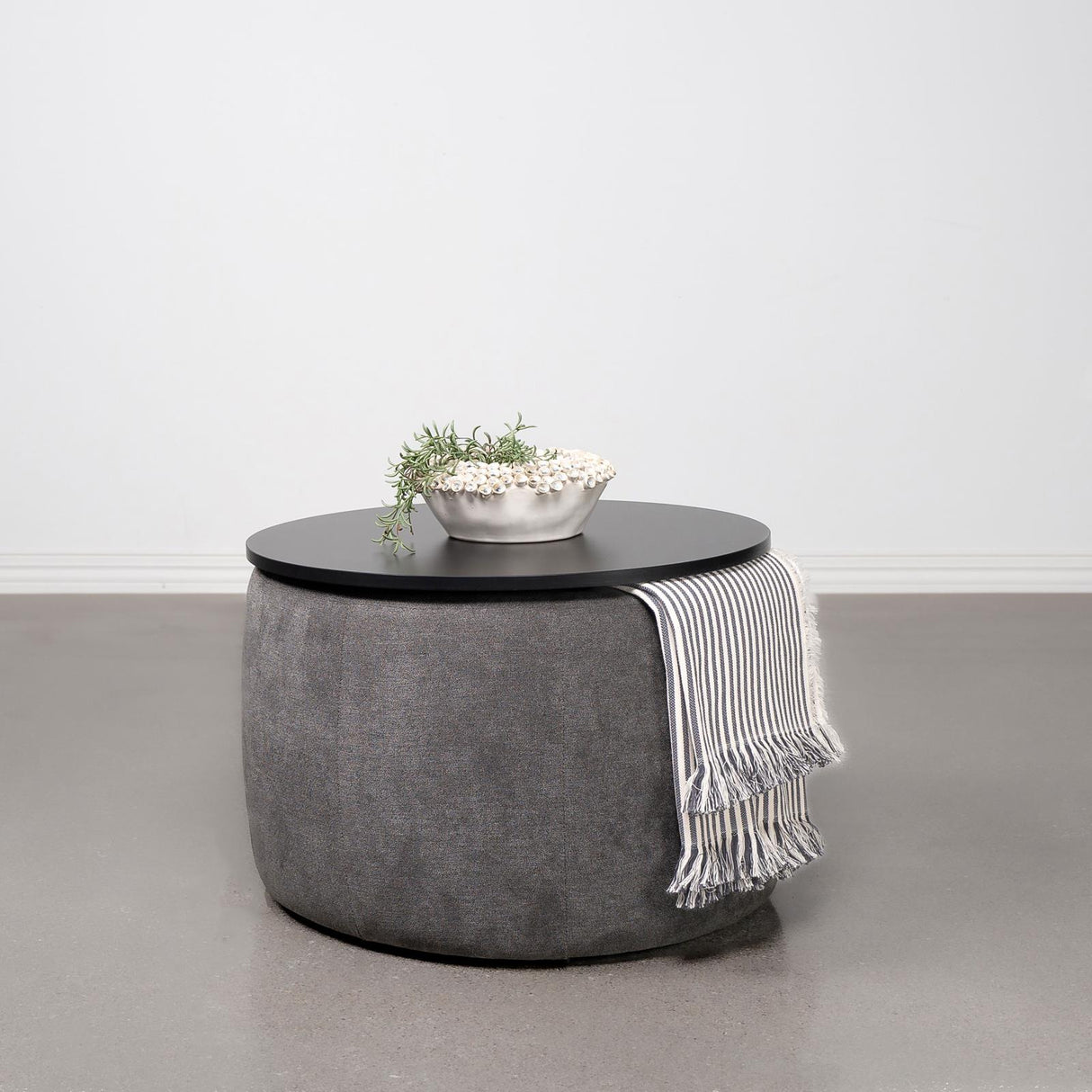 Tesoro Gray and Black Upholstered Round Lift Top Storage Ottoman from Coaster - Luna Furniture