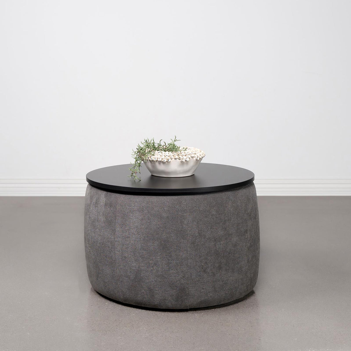Tesoro Gray and Black Upholstered Round Lift Top Storage Ottoman from Coaster - Luna Furniture